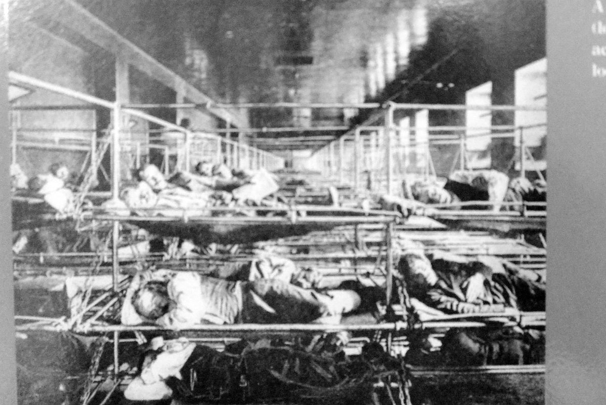 12-14 Photograph Of Immigrants In Rows Of Bunk Beds At Ellis Island Main Immigration Station Building